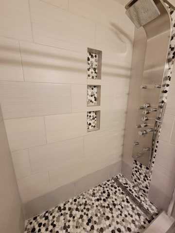 bathroom with a shower