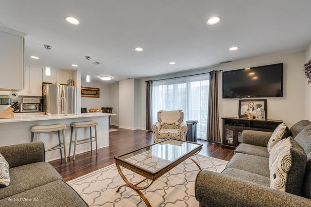 living room featuring dark hardwood / wood-style floors