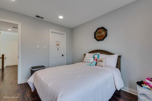 bedroom featuring dark wood-type flooring