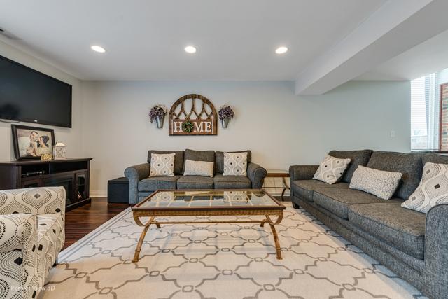 living room with wood-type flooring