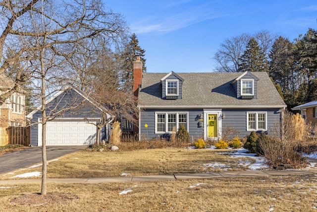 new england style home featuring a garage