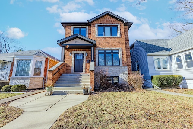 view of front of property with a front lawn