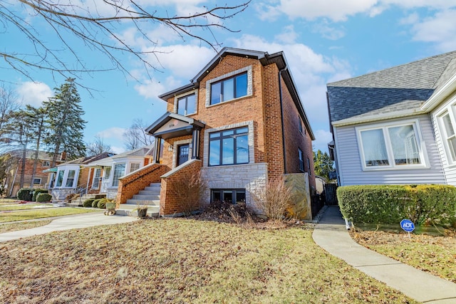 view of front of home with a front lawn