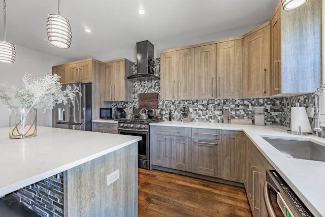 kitchen with dark hardwood / wood-style floors, decorative light fixtures, backsplash, stainless steel appliances, and wall chimney exhaust hood