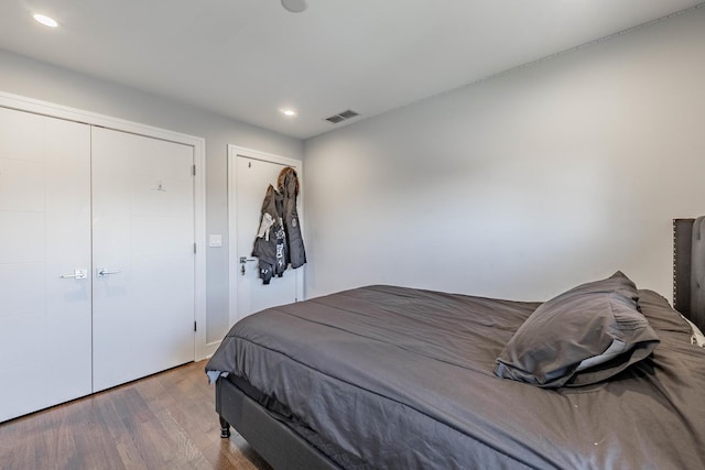 bedroom featuring hardwood / wood-style flooring