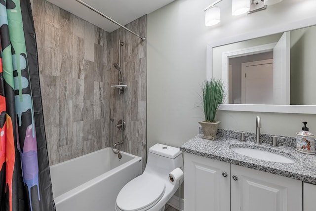 full bathroom with vanity, shower / tub combo with curtain, and toilet