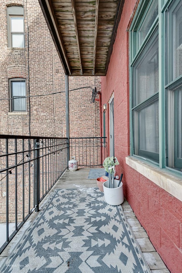 view of patio with a balcony