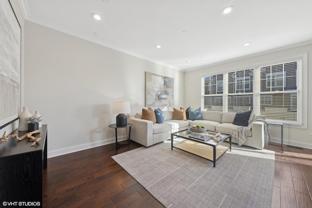 living room with hardwood / wood-style flooring and crown molding