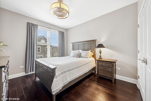 bedroom featuring dark wood-type flooring