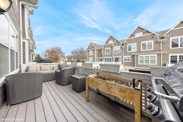 deck featuring outdoor lounge area