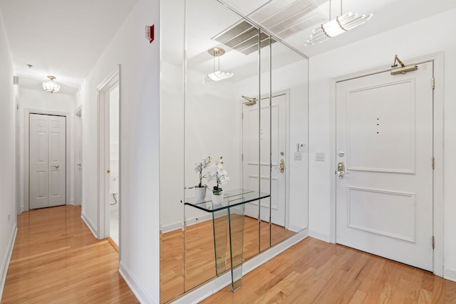 entrance foyer with wood-type flooring