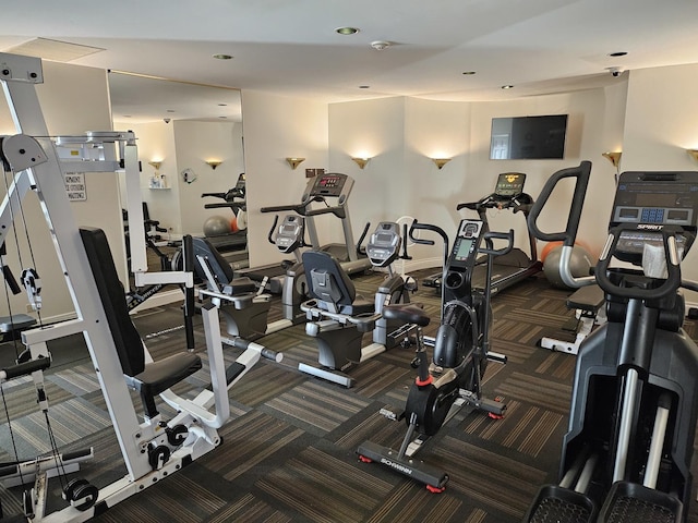 exercise room with carpet floors