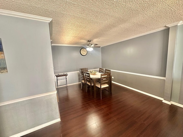 dining area with ceiling fan, dark wood-type flooring, and ornamental molding