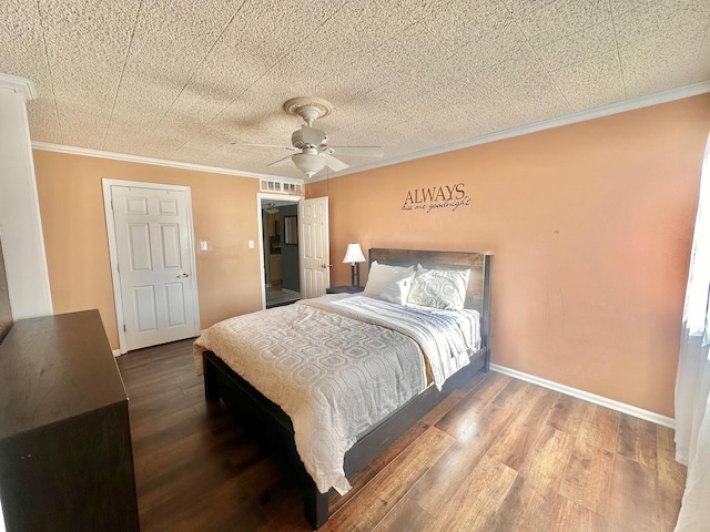 bedroom featuring ceiling fan, wood-type flooring, and crown molding