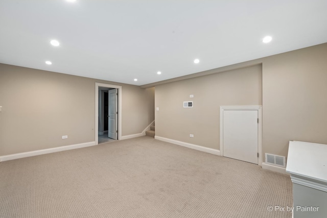 basement with light carpet