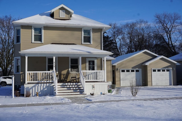 view of front facade featuring a porch and a garage