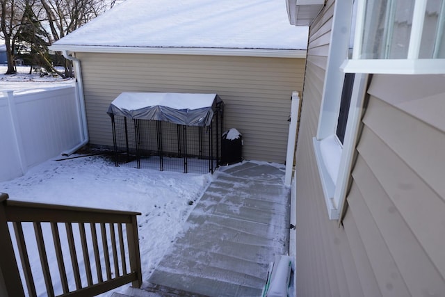 view of snow covered patio