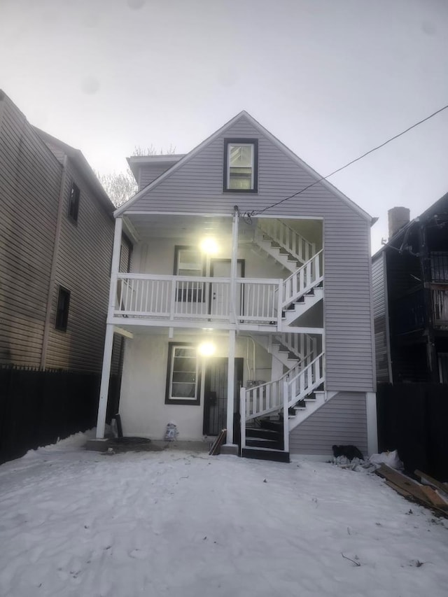 view of front of property with a balcony