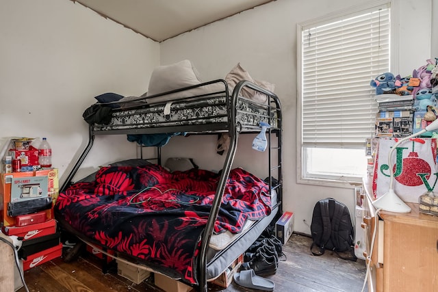 bedroom featuring hardwood / wood-style flooring