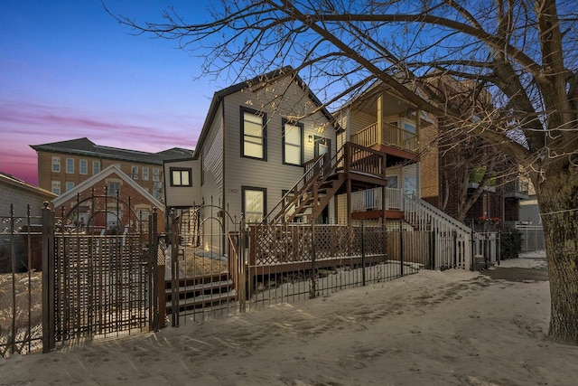 view of front of home with a balcony