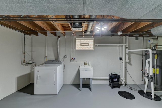 basement with washer / dryer and gas water heater