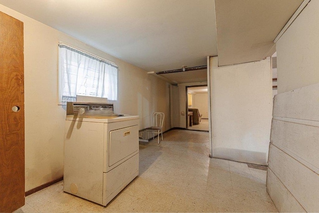 clothes washing area featuring washer / clothes dryer