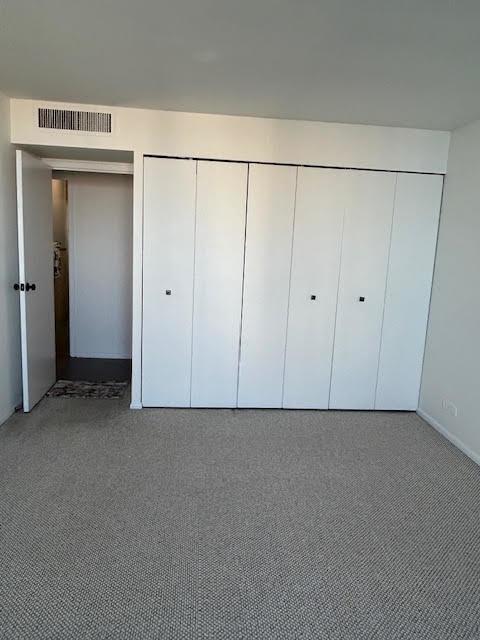 unfurnished bedroom featuring carpet floors