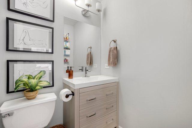 bathroom with vanity and toilet