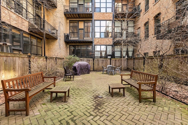 view of home's community with a patio