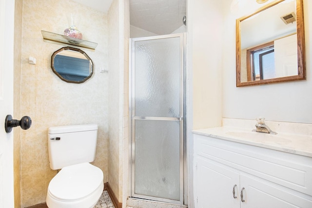 bathroom featuring toilet, an enclosed shower, and vanity