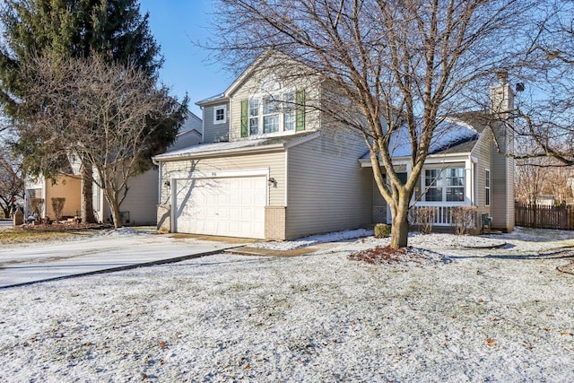 front of property featuring a garage