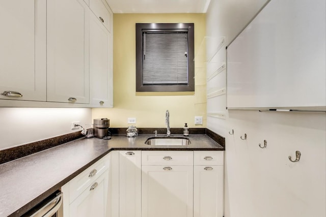 kitchen with sink and white cabinets