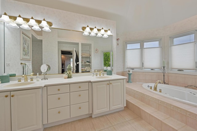 3430 Sandstone Ct, Lake In The Hills, IL 60156 - bathroom with double vanity, tile patterned flooring, a bath, and wallpapered walls