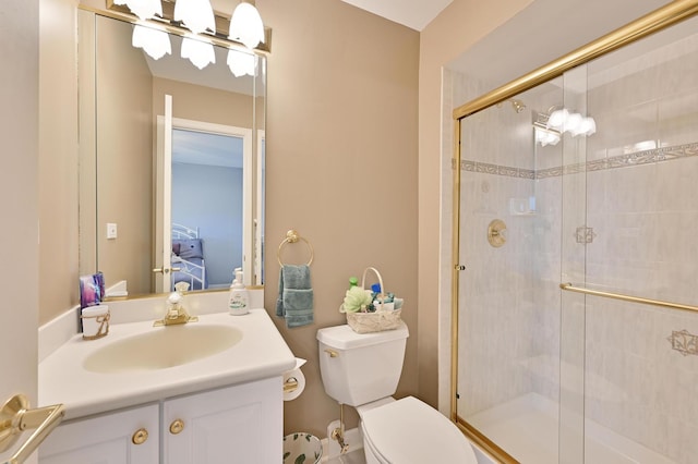 3430 Sandstone Ct, Lake In The Hills, IL 60156 - ensuite bathroom featuring a shower stall, toilet, and vanity