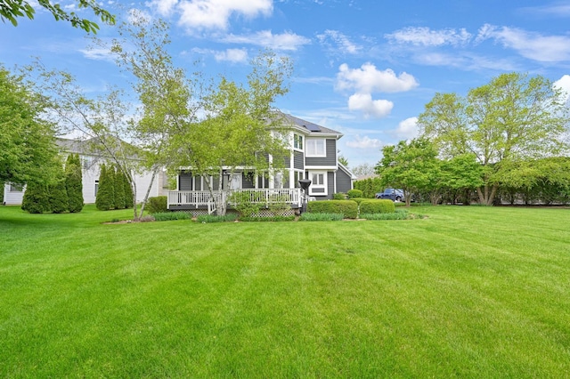 3430 Sandstone Ct, Lake In The Hills, IL 60156 - back of house with a yard and a wooden deck