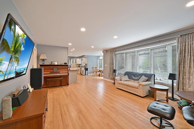 3430 Sandstone Ct, Lake In The Hills, IL 60156 - living area featuring light wood-type flooring, recessed lighting, healthy amount of natural light, and baseboards