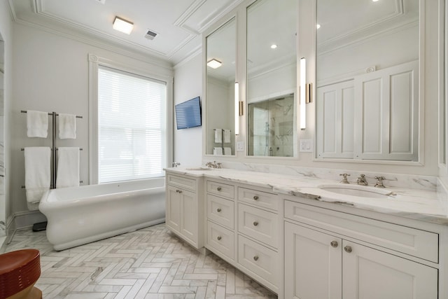 bathroom featuring vanity, a healthy amount of sunlight, shower with separate bathtub, and ornamental molding