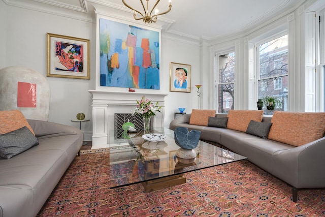 living room featuring an inviting chandelier and ornamental molding