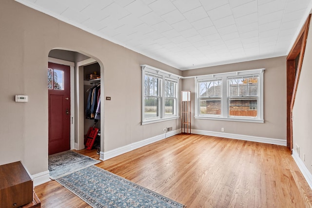 foyer with light wood-type flooring