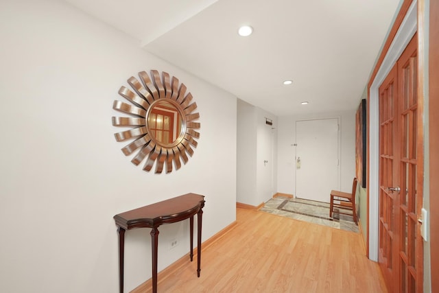 hallway featuring hardwood / wood-style flooring