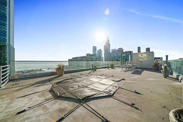 view of patio / terrace with a water view