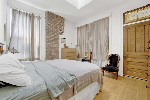 bedroom with light hardwood / wood-style flooring