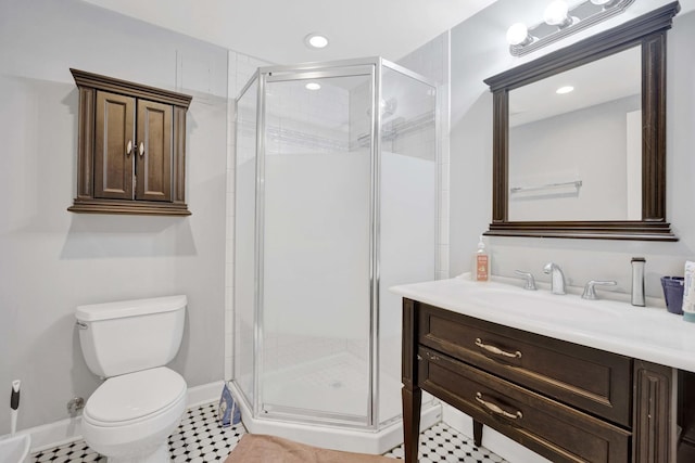 bathroom with walk in shower, tile patterned flooring, vanity, and toilet