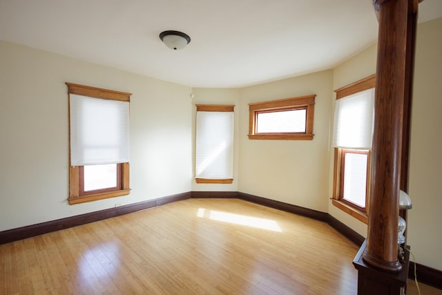 spare room with light hardwood / wood-style floors