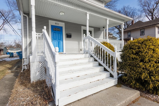 entrance to property with a porch