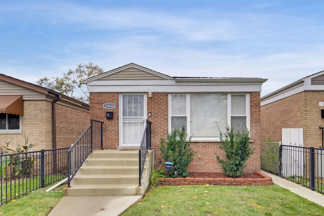 view of front facade with a front lawn