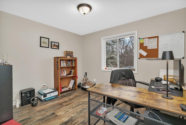 home office featuring hardwood / wood-style floors