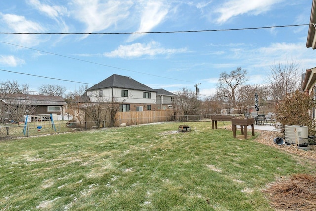 view of yard featuring an outdoor fire pit