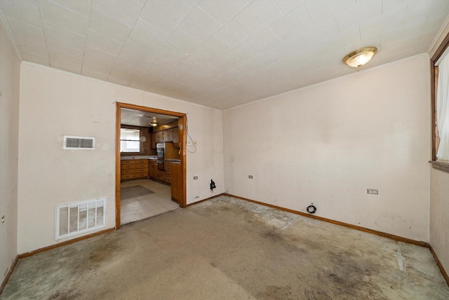 view of carpeted spare room