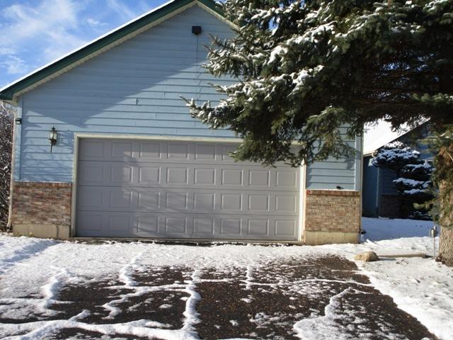 view of snow covered garage